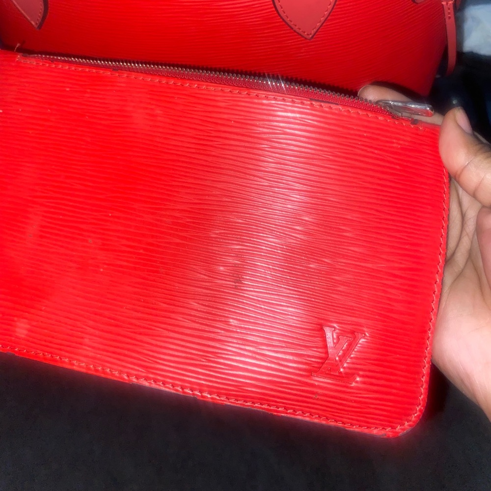 Never full red LV bag